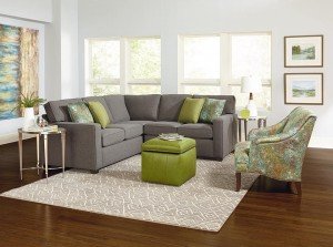 Chandler Sectional England Furniture with green pops of color throughout the living room
